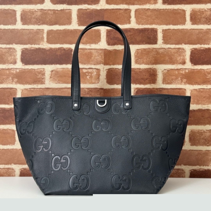G*u*i shopping bags